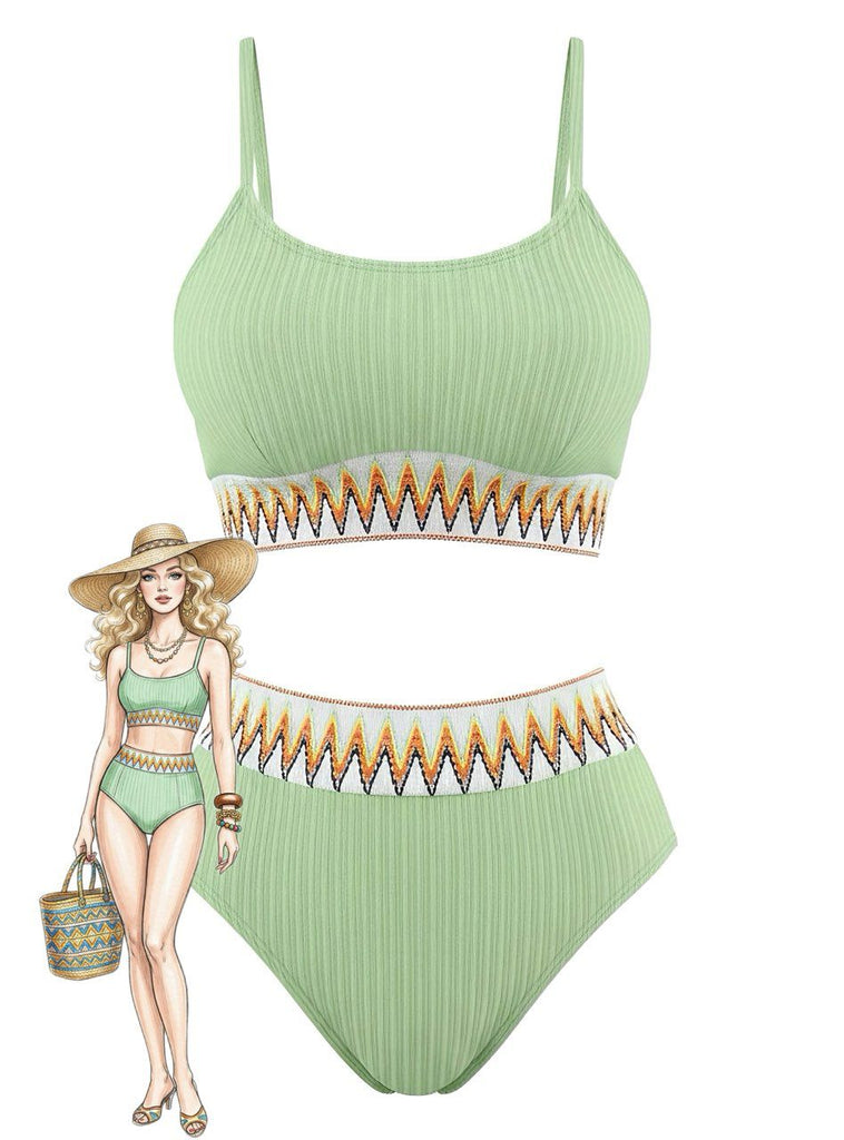 Green ribbed swimsuit with decorative trim on a white background