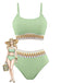 Green ribbed swimsuit with decorative trim on a white background