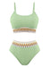Green ribbed bikini set with decorative waistband on a white background
