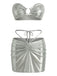 A metallic silver two-piece set featuring a strapless ruched bandeau top with a center ring detail and a matching high-waisted mini skirt with front ruching and tie-straps.