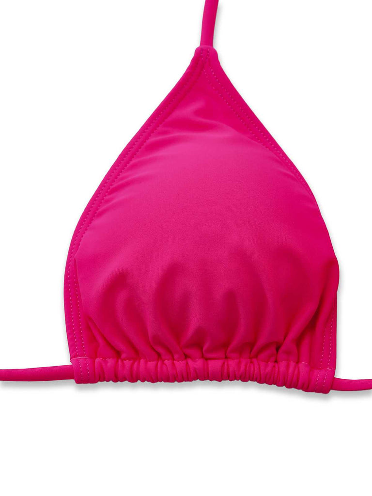 Close-up of the solid neon pink triangle bikini top featuring adjustable spaghetti straps.