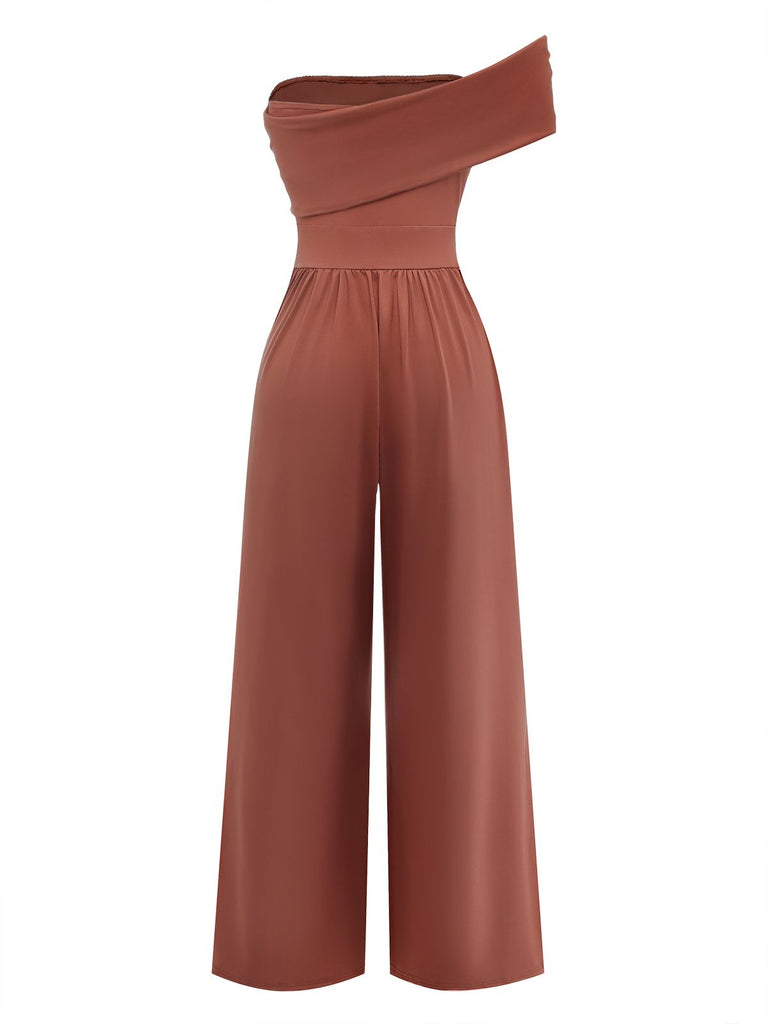 Rear view of the caramel-colored jumpsuit, showcasing the sleek fit and professional drape of the wide-leg trousers.