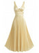 A sophisticated pale gold midi dress featuring a sleeveless V-neck bodice with gathered detailing and a full accordion-pleated skirt.