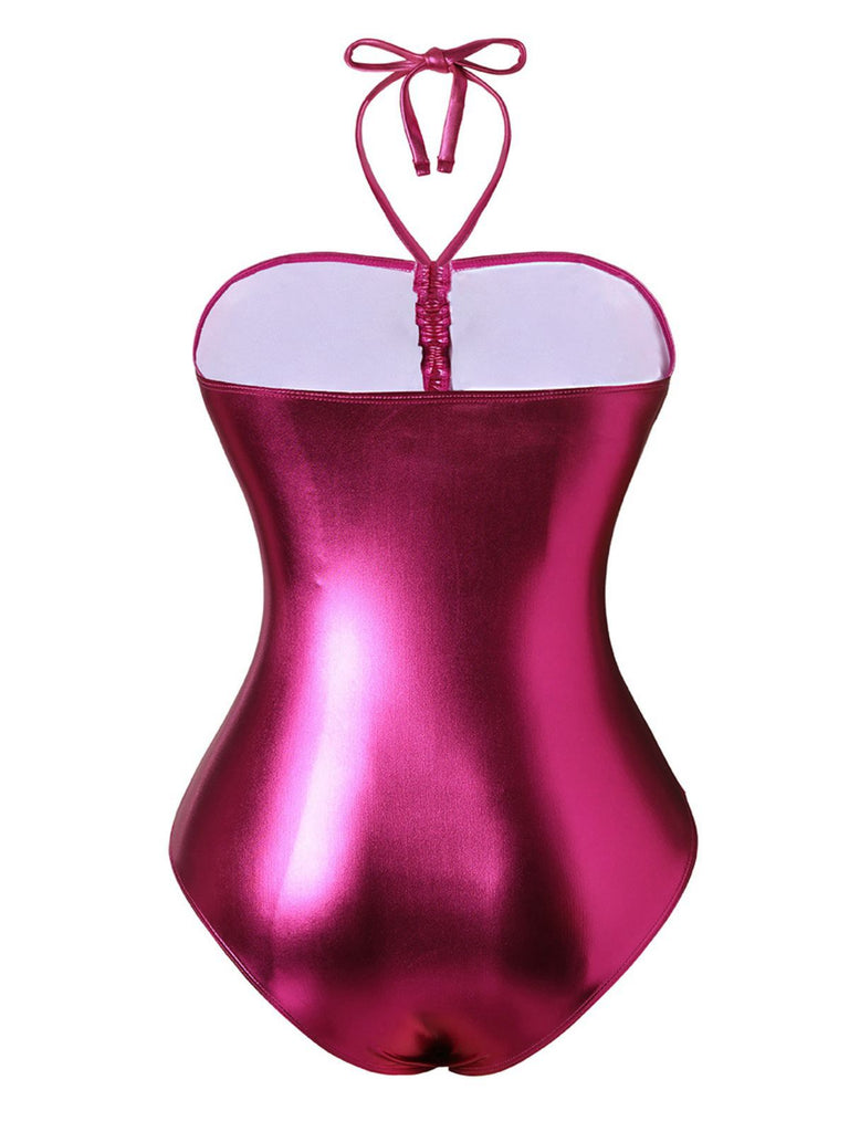 Shiny pink swimsuit on a white background