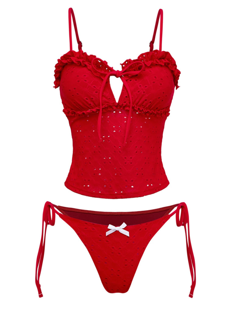 Retro red tankini set featuring intricate embroidery, feminine ruffle accents and side-tie design with classic 1960s charm, ideal for poolside elegance