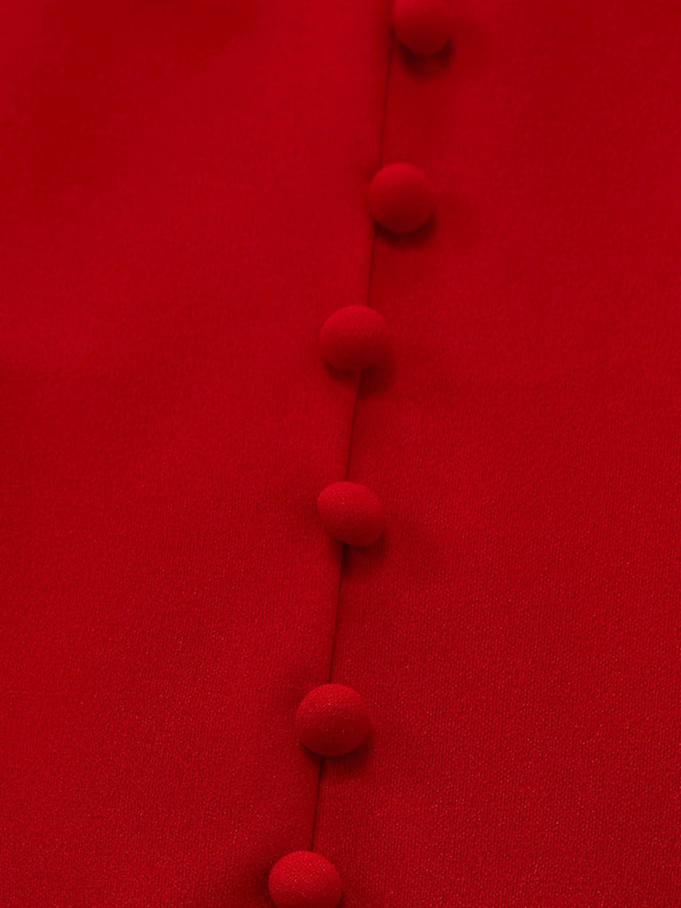 Close-up of a red fabric with a row of red buttons on a red background