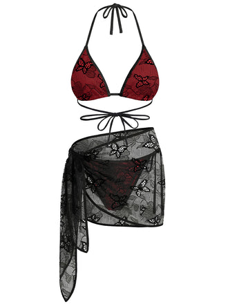 A three-piece swimwear set featuring a deep red triangle bikini with a black butterfly print and a matching black sheer mesh butterfly sarong.