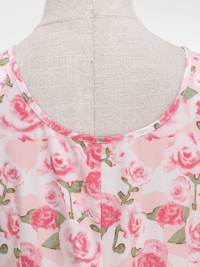 Detailed shot of the scoop neckline and interior lining of the pink floral A-line dress.