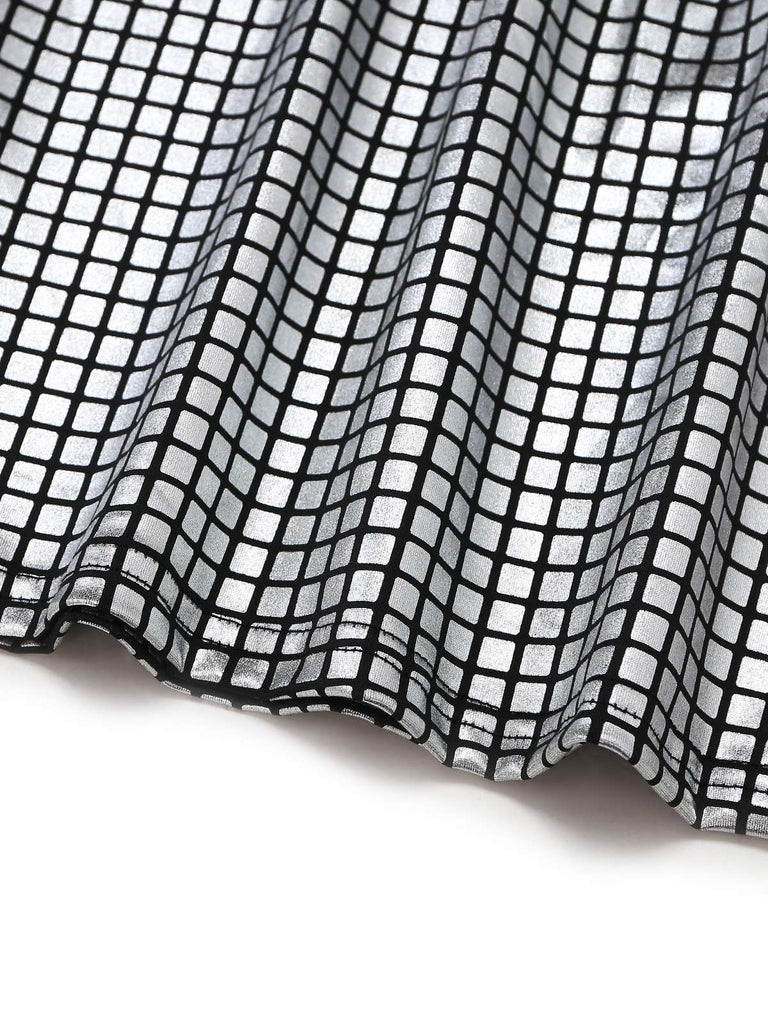 Close-up of black and white checkered fabric on a white background