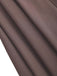 Detailed view of the taupe skirt's mid-weight textured fabric and the deep vertical pleat design.