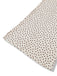 Fabric with polka dots on a white background