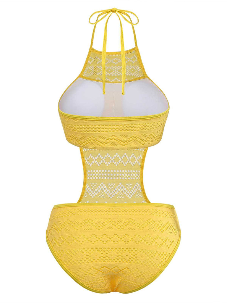 Back view of the yellow geometric lace monokini highlighting the halter tie closure and full-coverage bottom.
