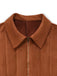 Close-up of the pointed collar and the gold-tone front zipper on the brown faux suede material.