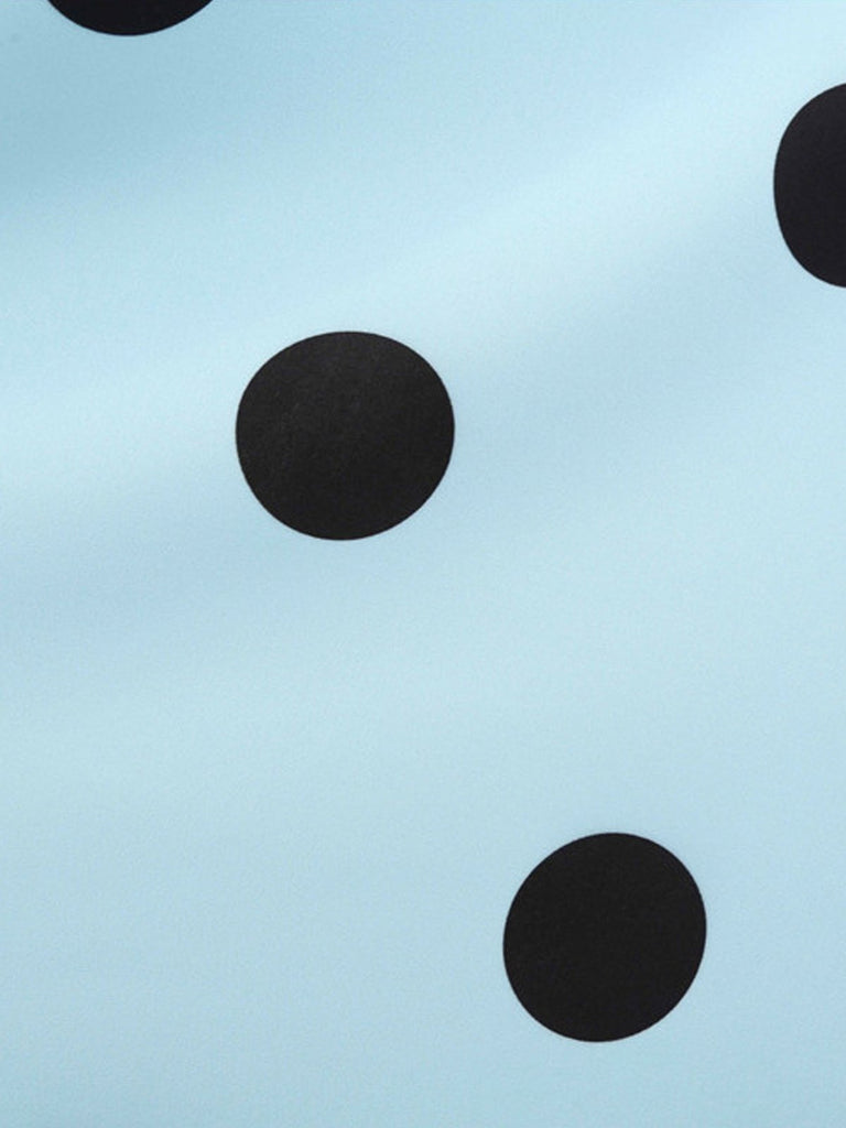 1950s Bow Polka Dot Swing Dress — vintage elegance for the modern woman