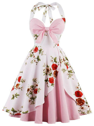 She slips into this 1950s Halter Floral Swing Dress and suddenly it's a 1950s daydream