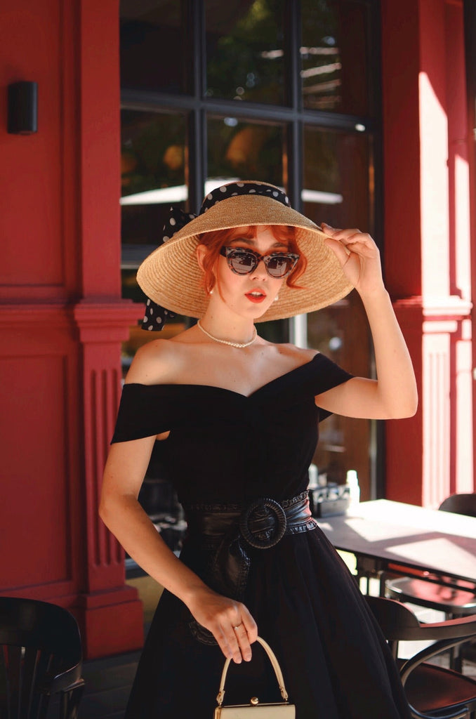 This 1950s Off Shoulder Swing Dress wraps her in 1950s elegance, one twirl at a time
