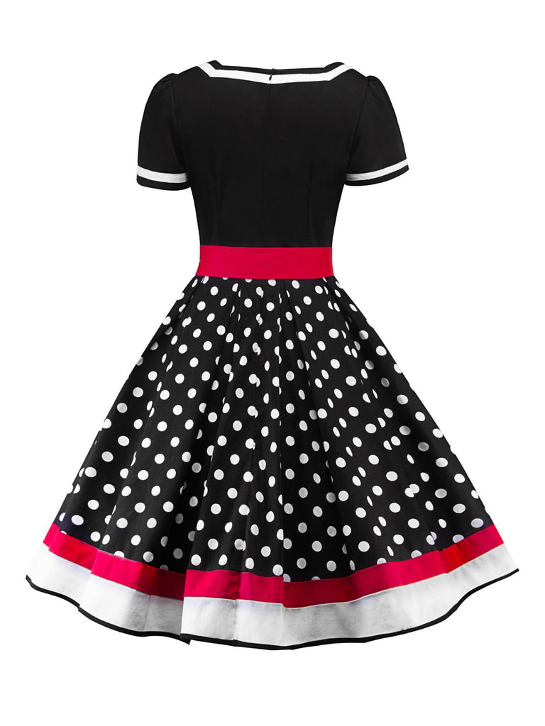 She wears 1950s Polka Dot Belted Patchwork Dress with vintage grace