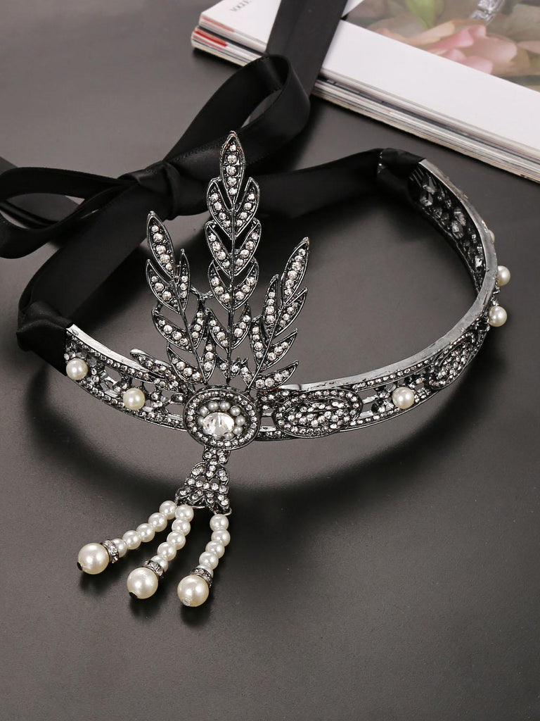 She wears Black 1920s Leaf Flapper Headband with vintage grace