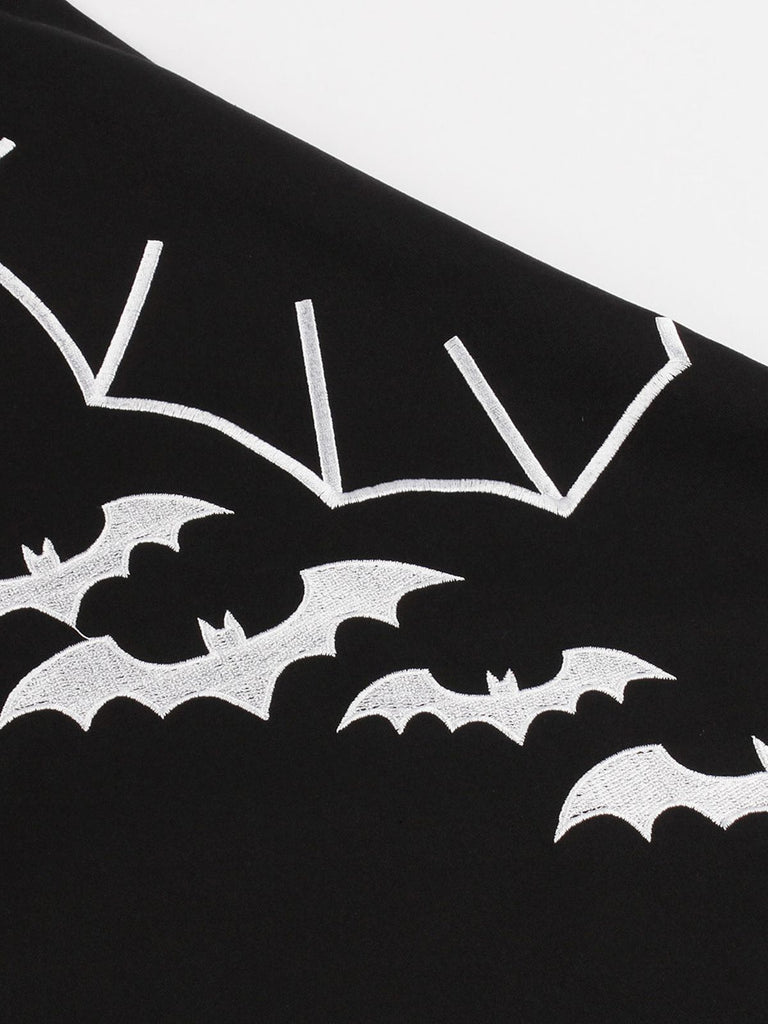 Black 1950s Bat Swing Dress — vintage elegance for the modern woman