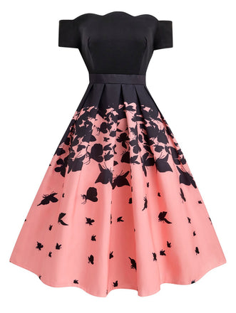 She slips into this Black 1950s Butterfly Swing Dress and suddenly it's a 1950s daydream