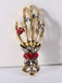Retro Halloween Skeleton Hand Brooch — vintage elegance for the modern woman