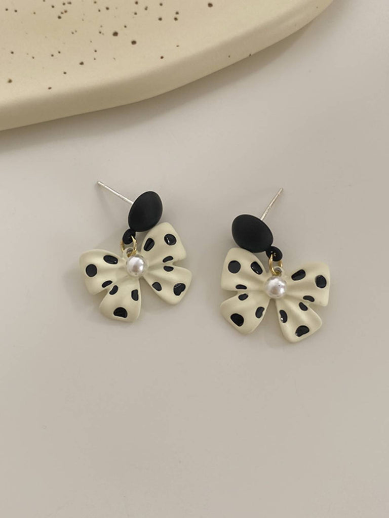 Retro Polka Dot Bowknot Earrings — vintage elegance for the modern woman