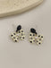 Retro Polka Dot Bowknot Earrings — vintage elegance for the modern woman