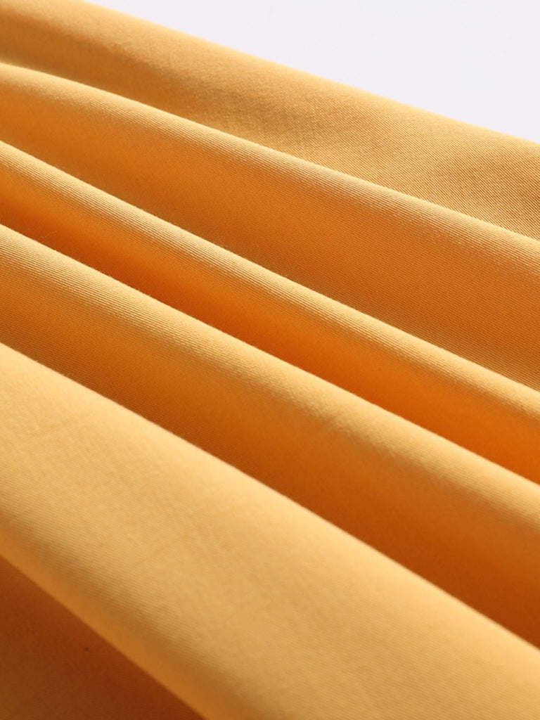 Yellow 1950s Solid Buttoned Swing Dress — vintage elegance for the modern woman